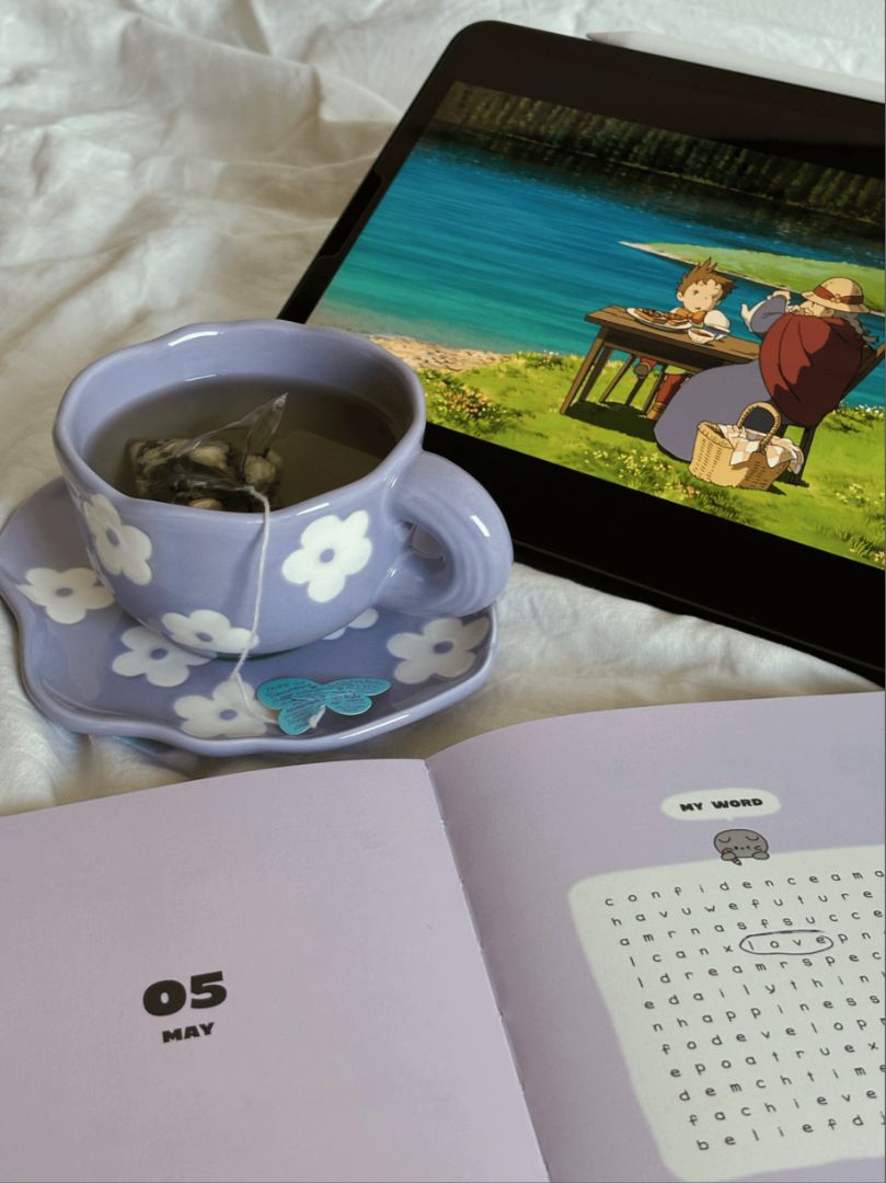 Momo Tea Cup. The cutest tea set with a cup and plate combination. Cute daisy flower design on pastel purple set. Aesthetic ceramic tea set. 