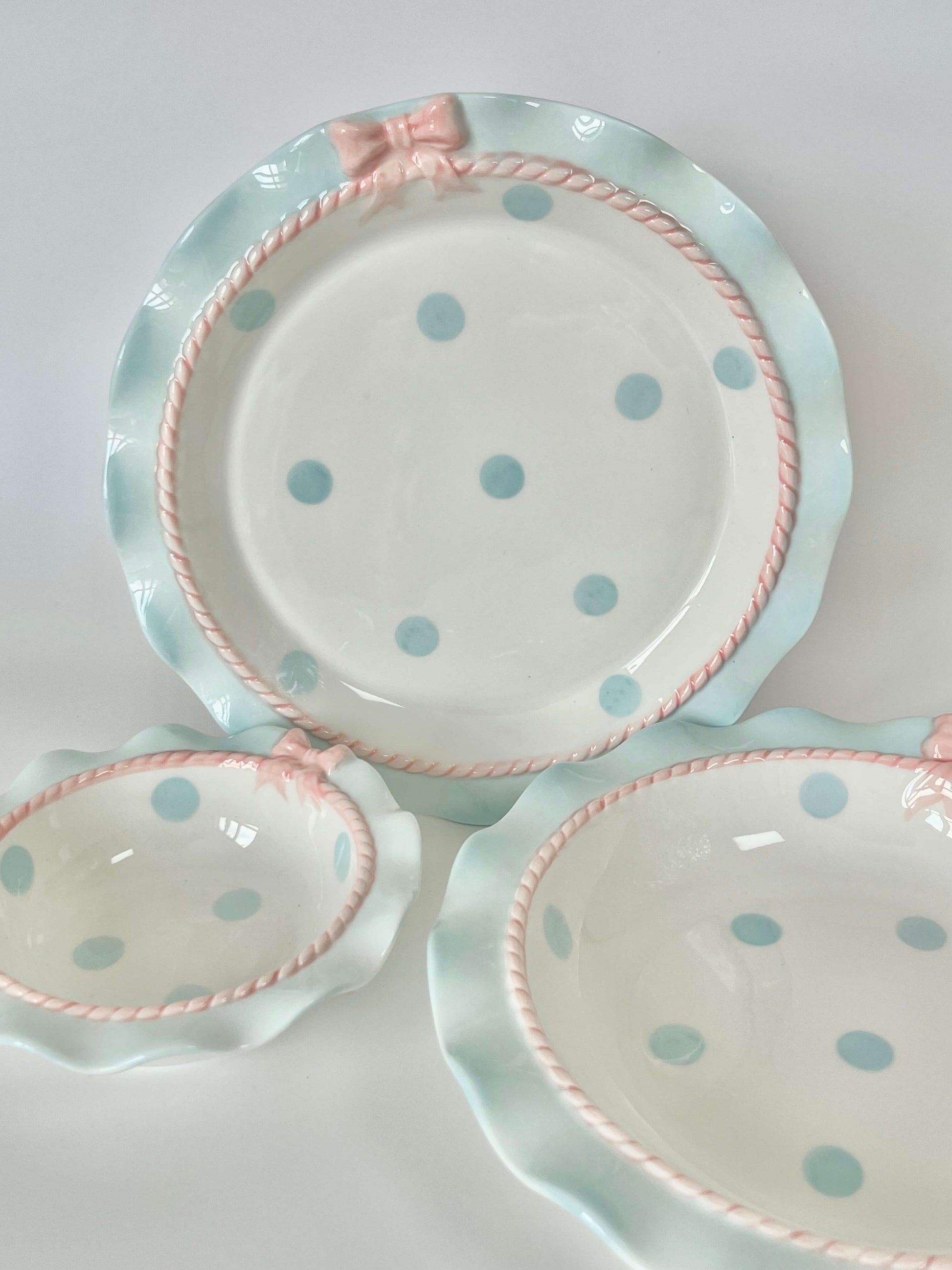 Coquette Core Cosette Set in Pastel Blue. The cutest crockery set with frills and bow designs on them. Spotted girly ceramic tableware for mothers and daughters. Plate and bowl set for dinner, lunch, breakfast. Perfect gift set for homeware.