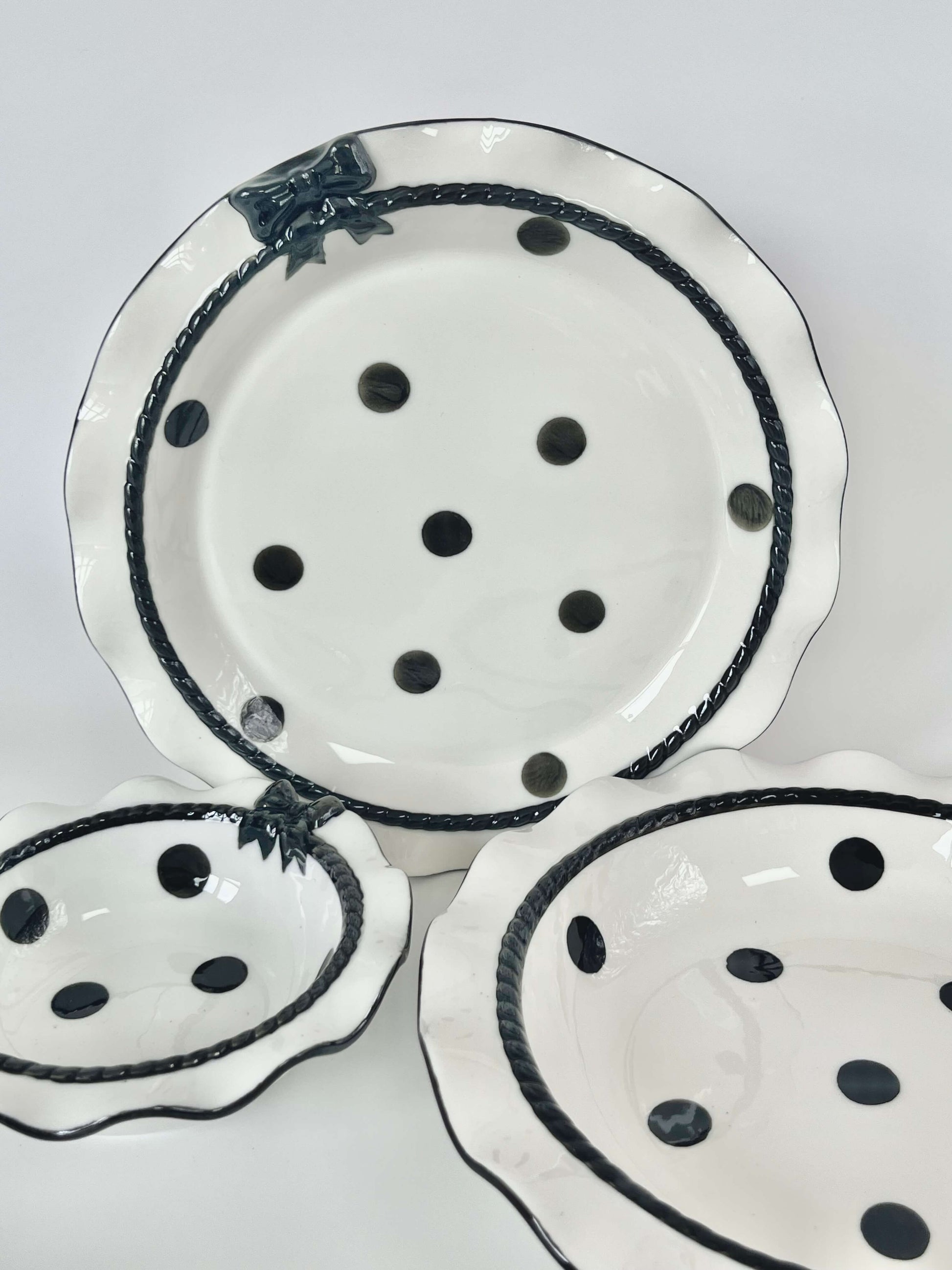 Coquette Core Cosette Set in White and Black. The cutest crockery set with frills and bow designs on them. Spotted girly ceramic tableware for mothers and daughters. Plate and bowl set for dinner, lunch, breakfast. Perfect gift set for homeware.